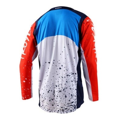 Camisola desportiva azul, branco e vermelho com padrão de respingos pretos