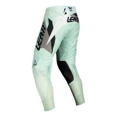 Calças verdes claras de motocross com detalhes em preto, branco e cinza e logo LEATT