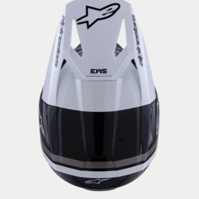 Capacete motocross branco e preto com texto EWS e logo Alpinestars