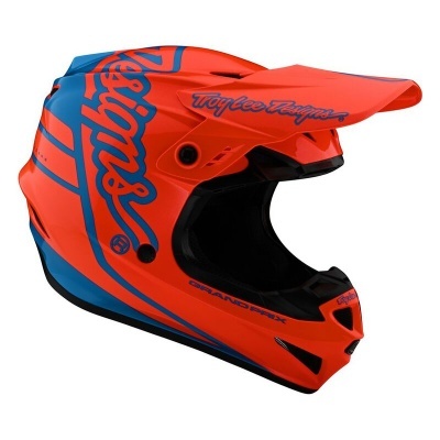 Capacete integral de motocross em laranja e azul com texto Troy Lee Designs