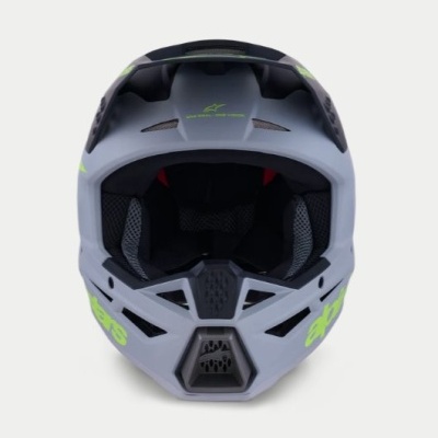 Capacete integral cinza com detalhes em verde neon e logótipo Alpinestars