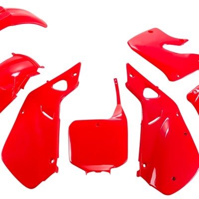 Conjunto de peças de carenagem de mota em plástico vermelho brilhante, fundo branco