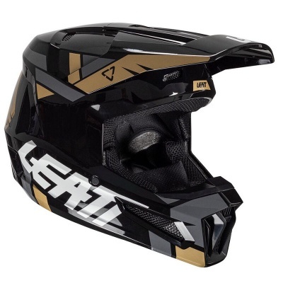 Capacete integral de motocross preto com detalhes dourados e cinzentos, texto LEATT branco