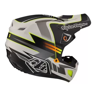 Capacete motocross Troy Lee Designs branco, preto, cinzento e amarelo com detalhes laranja
