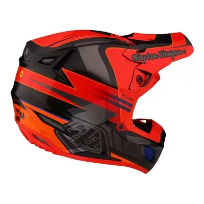 Capacete motocross vermelho e preto com design gráfico e texto Troy Lee Designs
