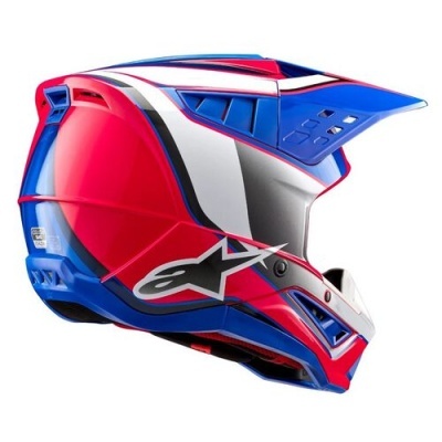 Capacete motocross vermelho, azul e branco com logótipo Alpinestars.