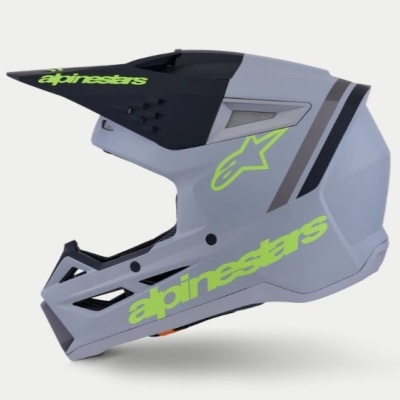 Capacete integral cinza com detalhes pretos e texto verde fluorescente alpinestars