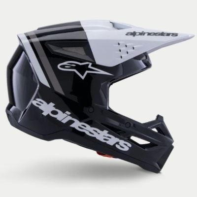 Capacete de motocross preto e branco com logo alpinestars