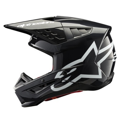 Capacete de motocross preto com detalhes em branco e visor