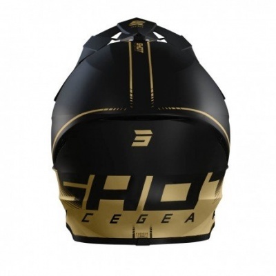 Capacete preto e dourado com texto 'SHOT LEGEA' na parte traseira