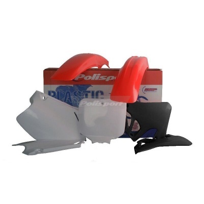 Kit de plásticos para motocicleta em vermelho, branco e preto com caixa Polisport ao fundo