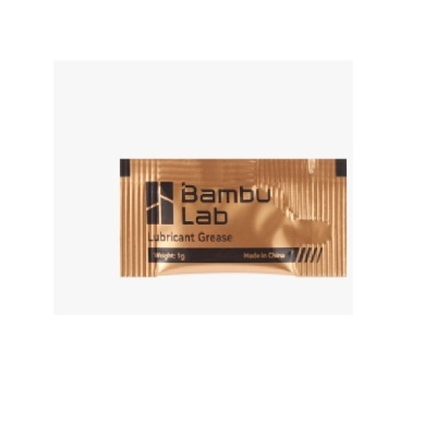 Saco dourado de graxa lubrificante Bambu Lab com texto preto