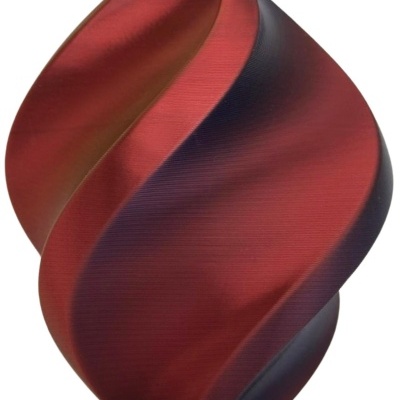 Vaso cerâmico vermelho e preto com padrão ondulado.