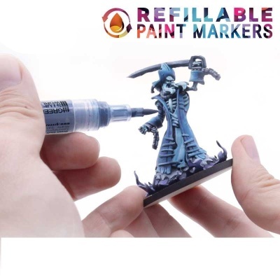Miniatura de esqueleto azul a ser pintada com marcador recarregável