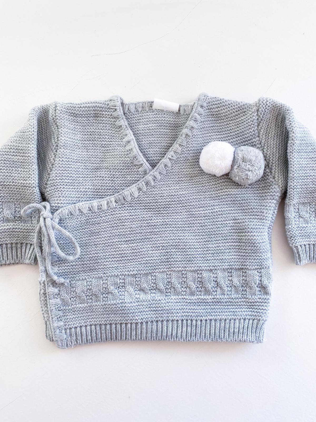 Casaco de malha cinza traçado