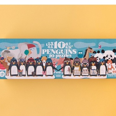 Caixa de puzzle colorida com pinguins e pandas sobre fundo amarelo