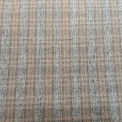Tecido aos quadrados em tons de bege, cinzento e castanho