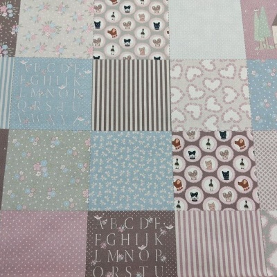 tecido patchwork colorido com padrões variados em tons pastel