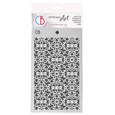 Stencil decorativo branco em fundo cinzento em embalagem plástica com logótipo e texto.