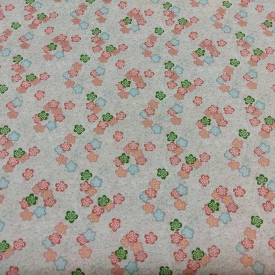 Tecido com padrão de flores coloridas e fundo cinzento claro