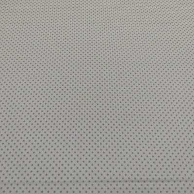 Tecido branco com pequenos asteriscos azuis