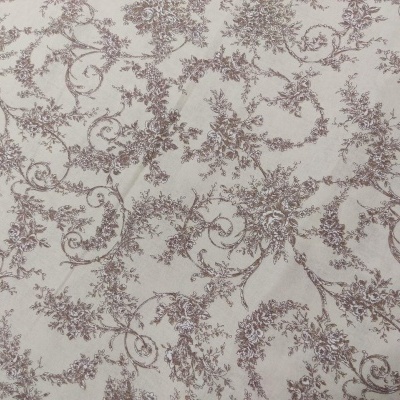 Tecido branco com padrão floral castanho claro