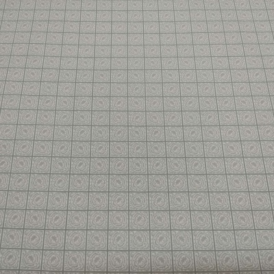 Papel de parede cinzento com padrão de quadrados e motivos florais circulares em relevo