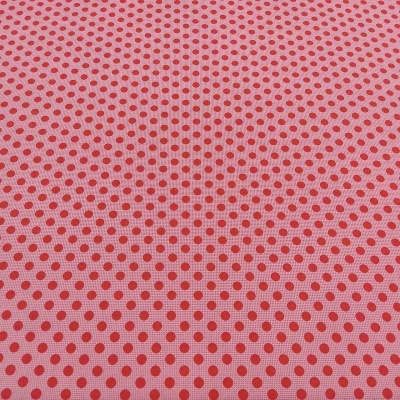 Tecido cor-de-rosa com bolinhas vermelhas em padrão