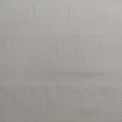 tecido bege claro com pequenos pontos pretos