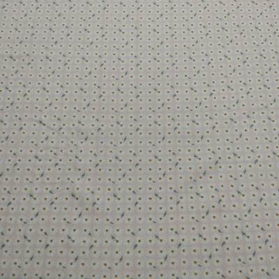 Tecido branco com padrão floral amarelo e verde