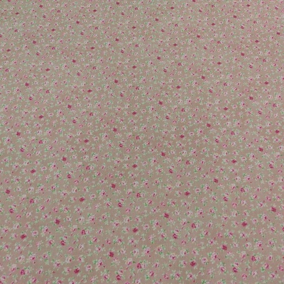 tecido bege claro com padrão de pequenas flores rosa e lilás