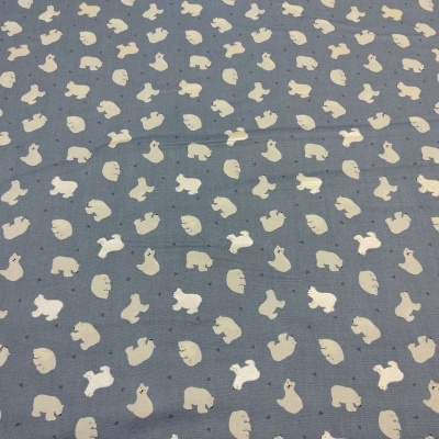 Tecido azul com padrão de pequenos animais brancos repetidos