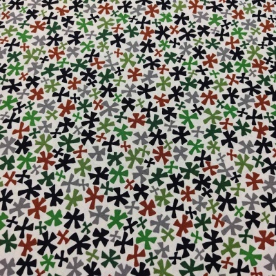 Tecido com padrão de flores coloridas sobre fundo branco