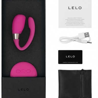 Conjunto de dispositivo em silicone rosa com controlo, cabo USB, cartão e saquinho de armazenamento da marca LELO