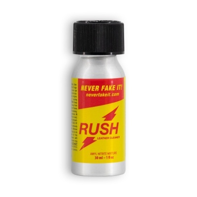 Frasco pequeno prateado com tampa preta e rótulo amarelo e vermelho RUSH Leather Cleaner