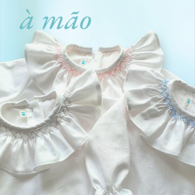 Camisa body smocks azul claro