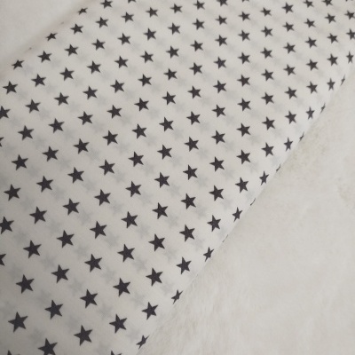 Tecido poppy estrelas