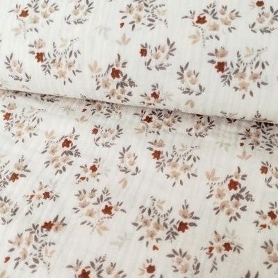 Musselina floral com fundo creme/areia