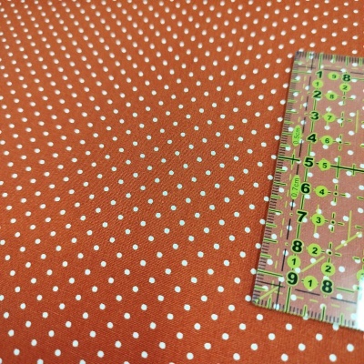 Tecido poppy pintinhas