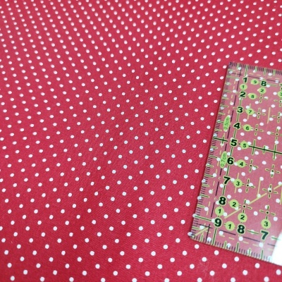 Tecido poppy pintinhas