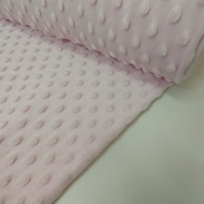tecido cor de rosa claro com bolinhas em relevo