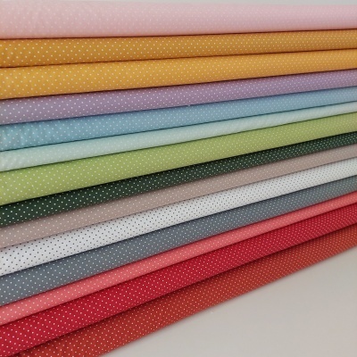 Tecido poppy pintinhas