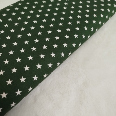 Tecido poppy estrelas