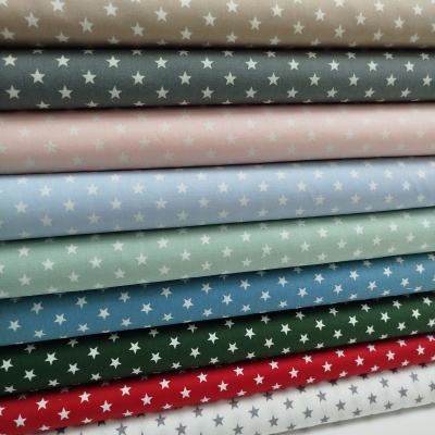 Tecido poppy estrelas