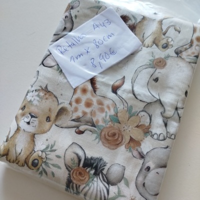 Retalho de tecido com padrão de animais selvagens e etiqueta com medidas e preço