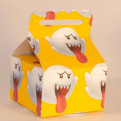 Caixa amarela com padrão de fantasmas brancos a mostrar língua e dentes