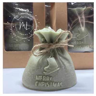 Vela decorativa em forma de saco de Pai Natal