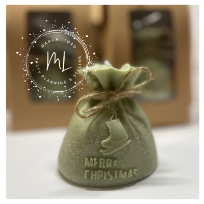 Vela decorativa em forma de saco de Pai Natal Vela decorativa em forma de saco de Pai Natal