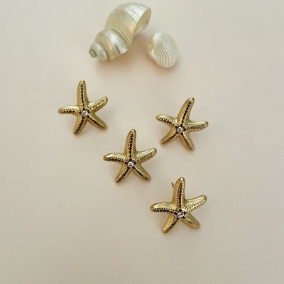 Brincos estrela do mar com zircónia