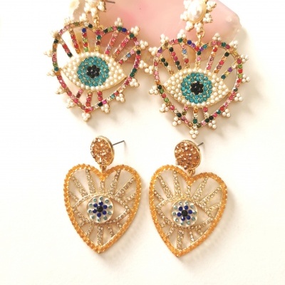 Brincos olho XL e XXL